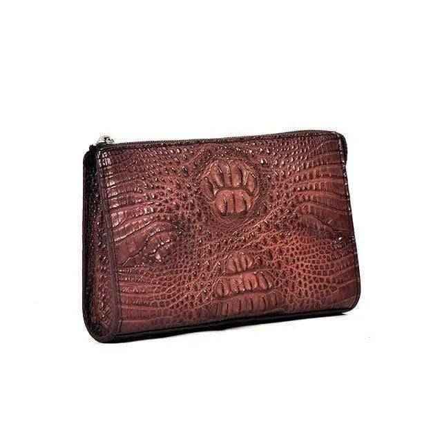 Brown crocodile skin leather clutch bag for men with a zip top, by Rossie Viren, featuring textured crocodile pattern and sleek design.