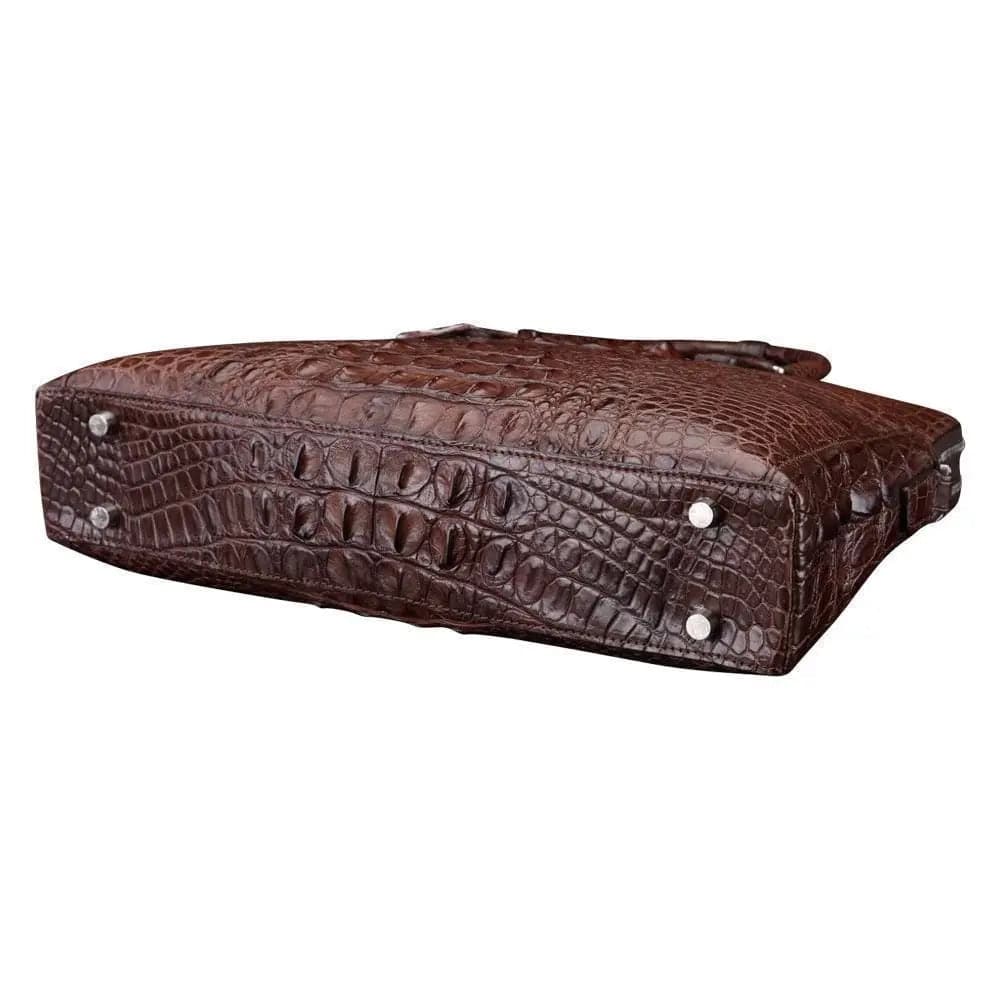 Brown crocodile leather large volume briefcase from Rossie Viren with sturdy handles and spacious interior.
