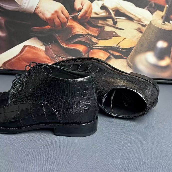 Black genuine crocodile leather boots by Rossie Viren, featuring a sleek design and detailed crocodile texture.
