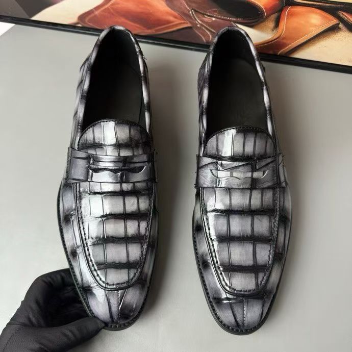 Vintage grey crocodile leather loafer shoes by Rossie Viren, showcasing the textured crocodile pattern and classic slip-on style.