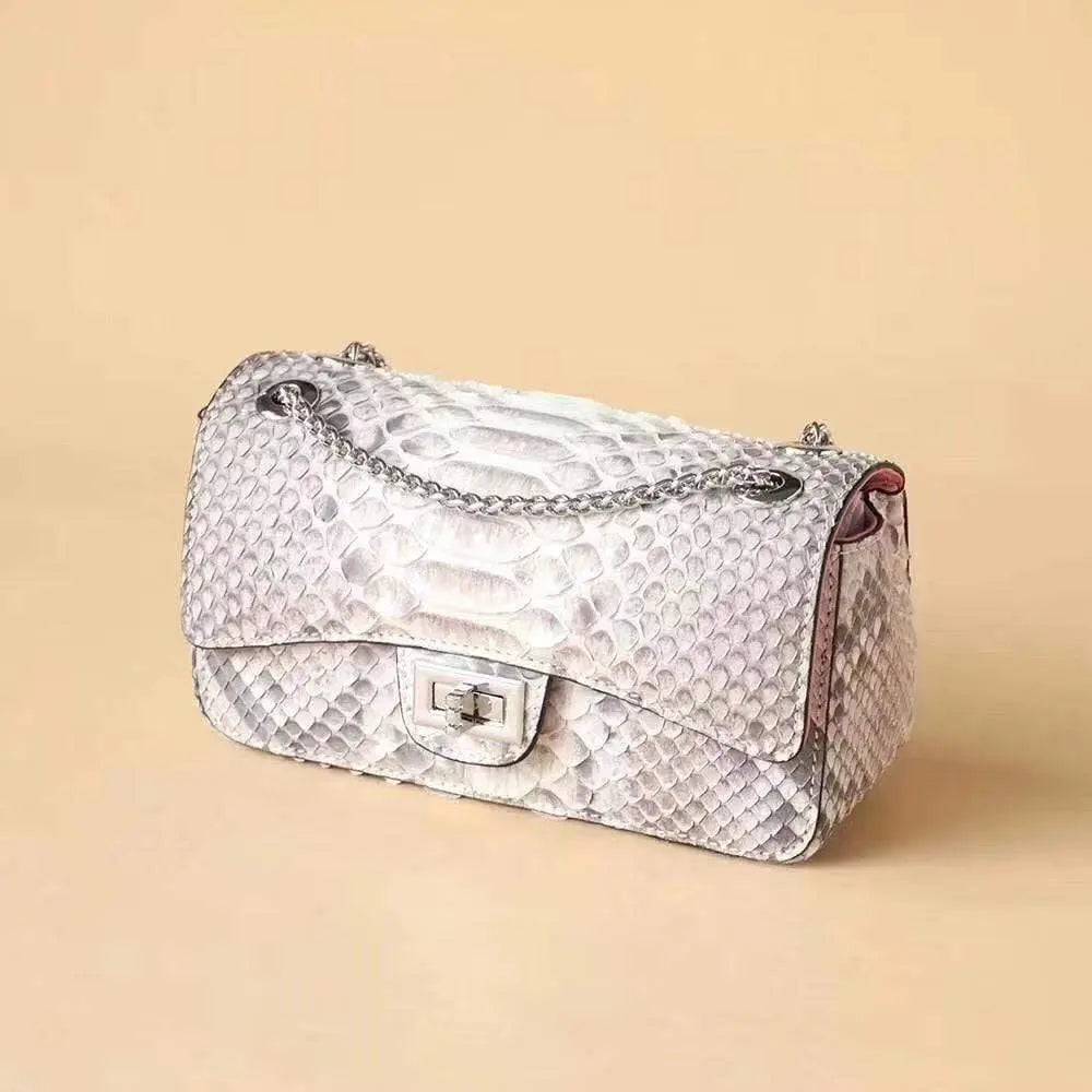 Grey Rossie Viren women's crossbody handbag with classic chain and double flap, crafted from genuine python leather.