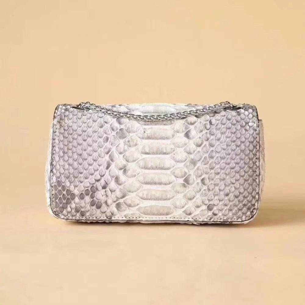 Rossie Viren women's grey genuine python leather crossbody handbag with double flap and classic chain detail.