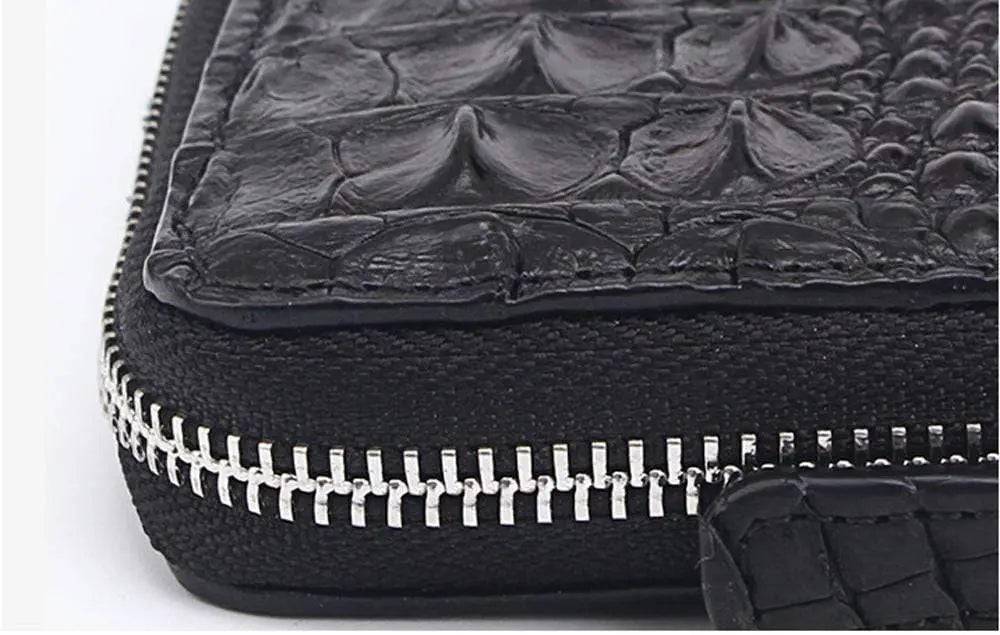 Rossie Viren crocodile leather zipper wallet handbag with textured crocodile pattern and gold-tone zipper closure.