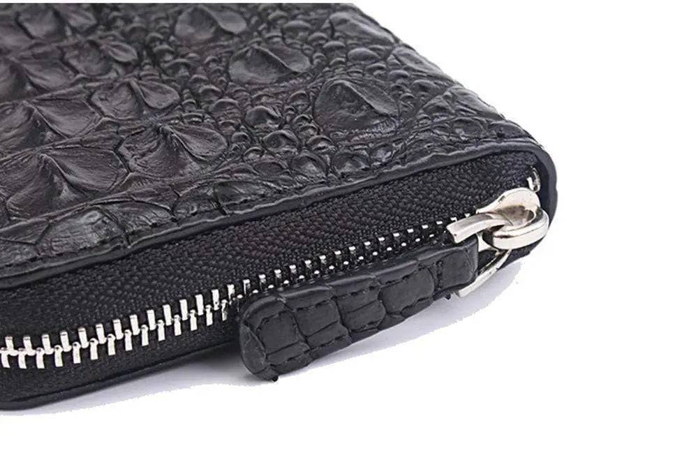 Rossie Viren crocodile leather zipper wallet with sleek design, showing the textured crocodile pattern and metal zipper closure.