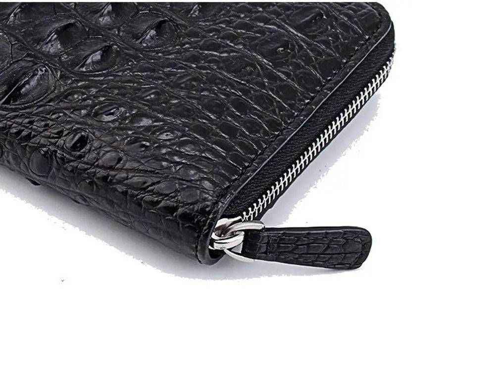 Rossie Viren crocodile leather zipper wallet handbag with textured crocodile pattern and gold zipper closure.