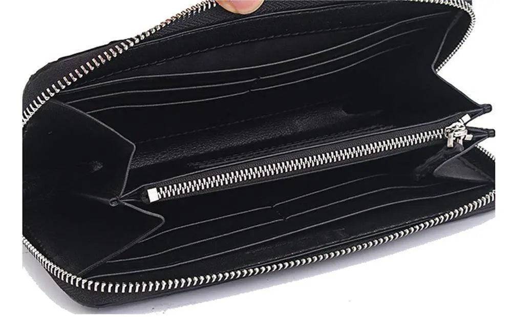Rossie Viren crocodile leather zipper wallet handbag with textured crocodile pattern and silver zipper detail.