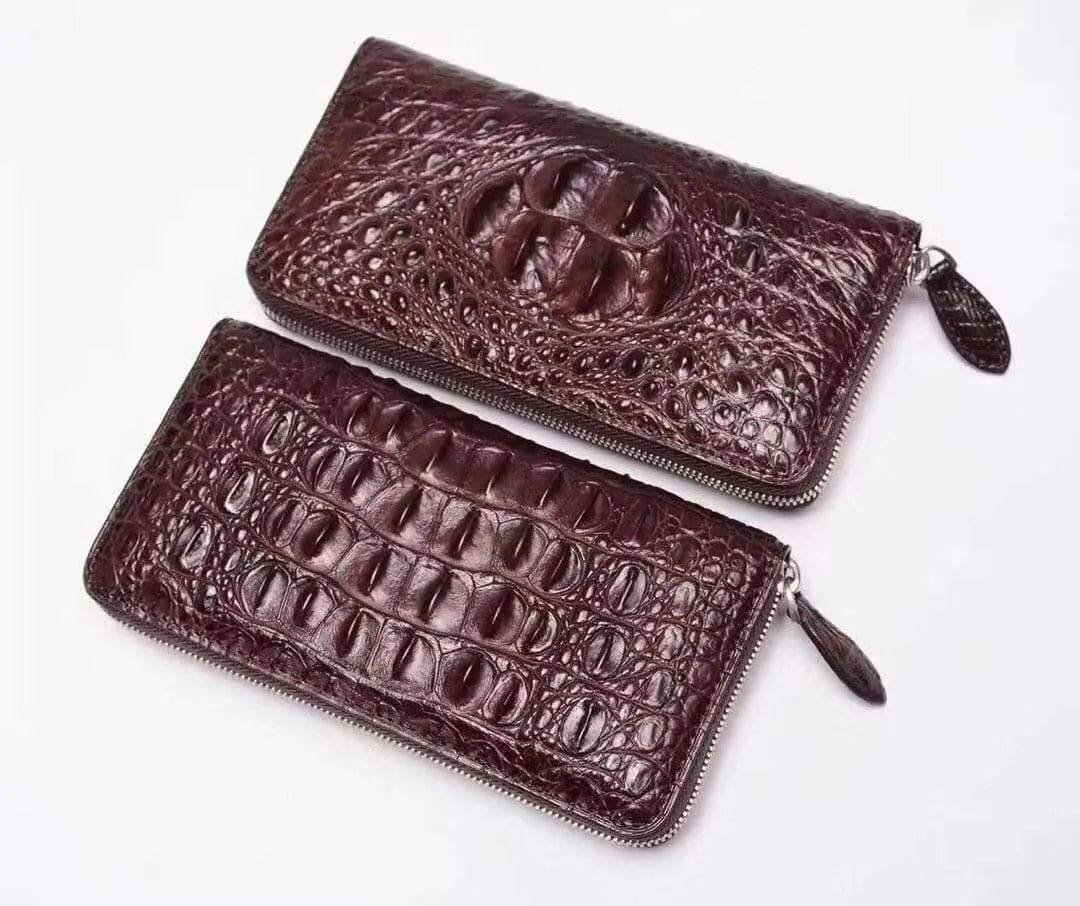 Rossie Viren crocodile leather zipper wallet handbag with textured crocodile pattern and silver zipper closure.