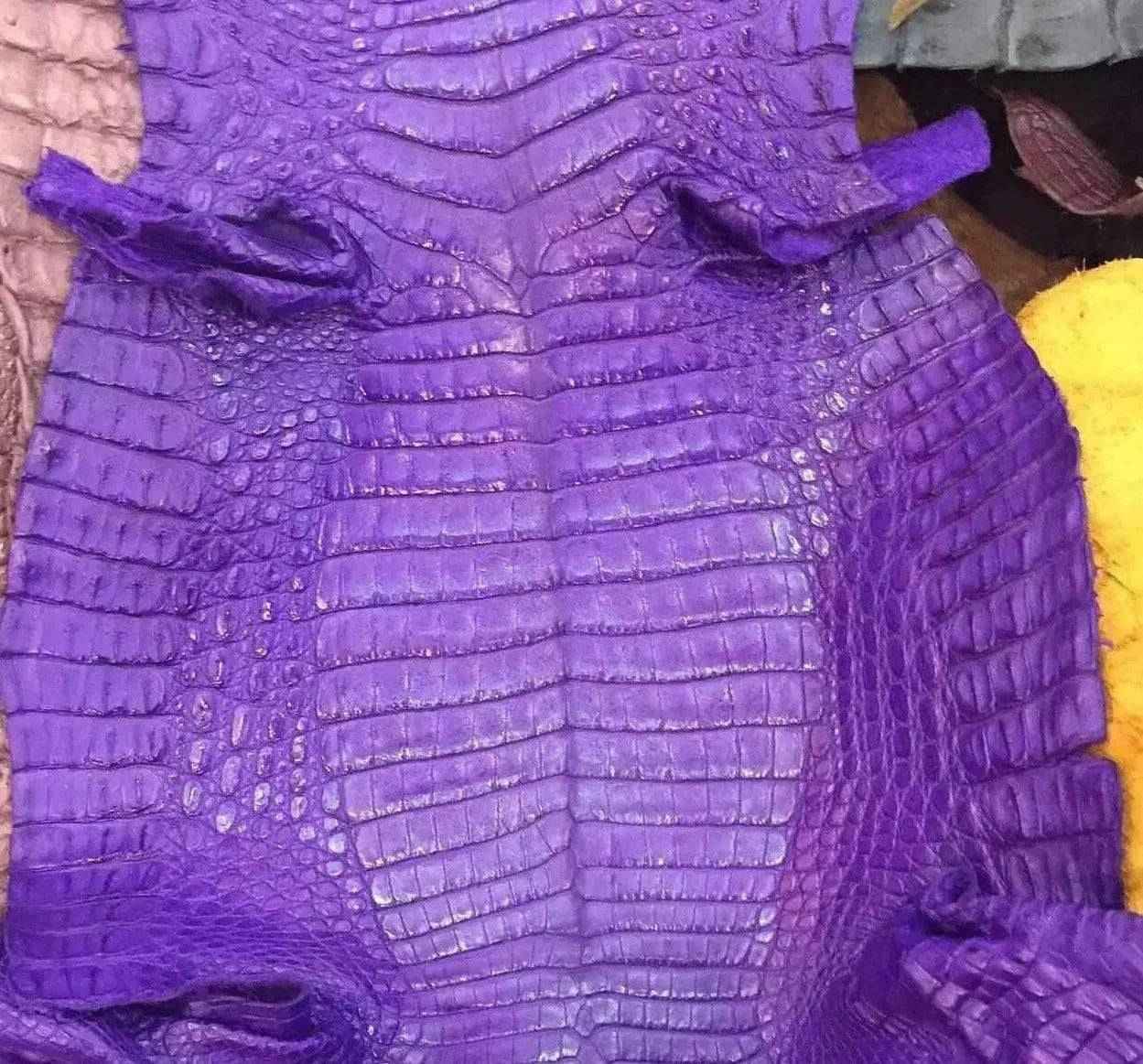 Crocodile skin belly leather in a colorful colorway, showcasing textured and glossy crocodile leather from Exotic Skin Leather Bags.