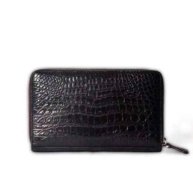 Rossie Viren crocodile belly skin clutch with credit card slots and wallet sections for modern money storage.