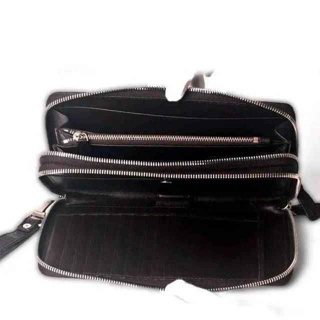 Rossie Viren crocodile belly skin clutch with credit card slots and wallet compartments for modern money storage.