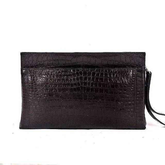 Rossie Viren crocodile belly skin large clutch bag with textured crocodile pattern and sleek, elegant design.