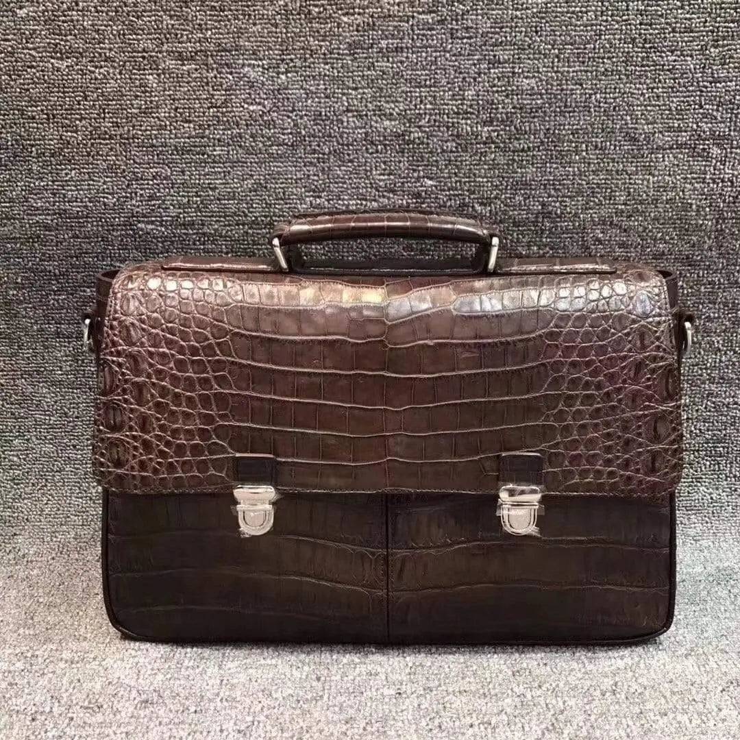 Rossie Viren crocodile belly leather lock briefcase handbag with sleek design and sturdy handle.