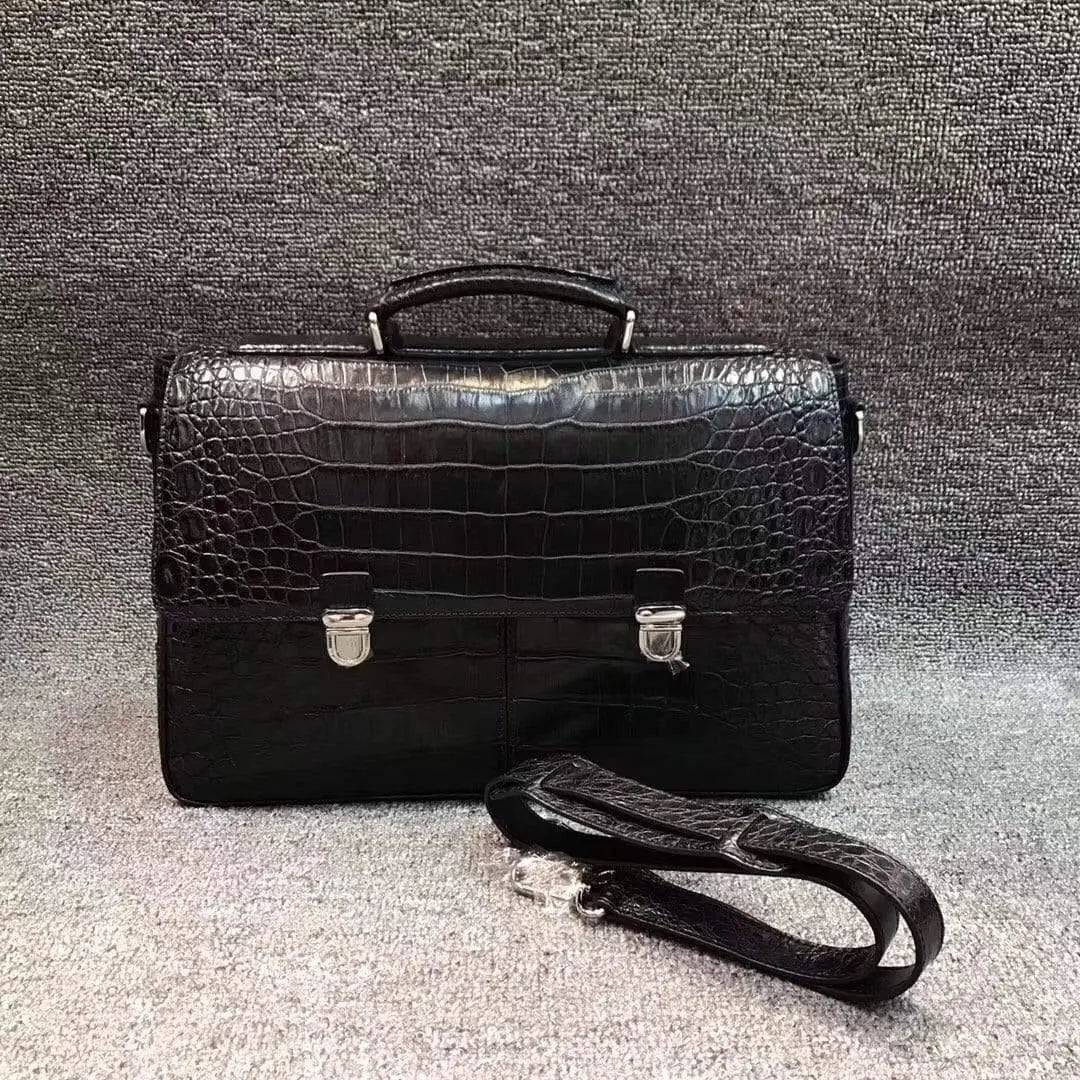 Rossie Viren crocodile belly leather lock briefcase handbag with sleek design and textured crocodile pattern.