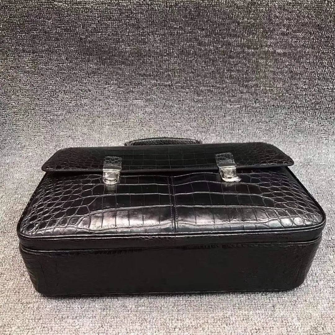 Rossie Viren crocodile belly leather lock briefcase handbag with textured crocodile pattern and sturdy handle.
