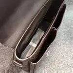 Rossie Viren crocodile belly leather lock briefcase handbag with sleek design and textured crocodile skin finish.