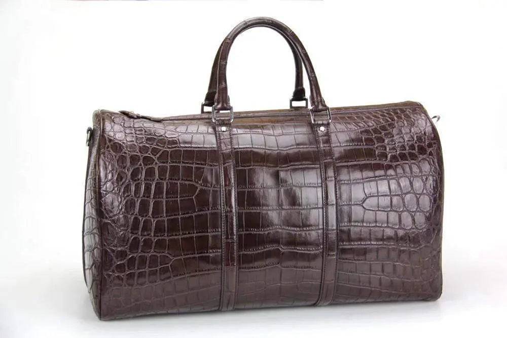 Rossie Viren crocodile belly small travel duffel bag, handbag with textured crocodile pattern and sturdy handle.