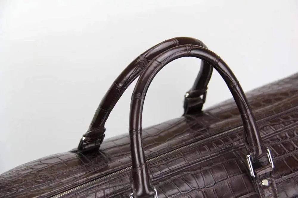 Rossie Viren crocodile belly small travel duffel bag, handbag with textured crocodile pattern and sturdy handle for travel.