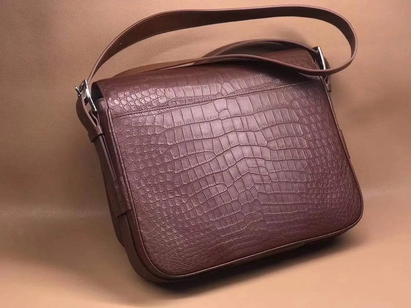 Rossie Viren crocodile garment leather medium messenger bag with soft texture, showcasing a stylish handbag design with a flap closure.