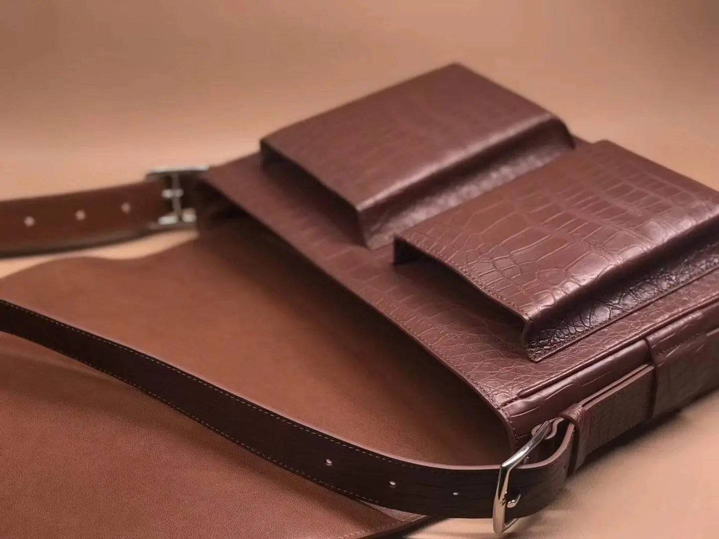 Rossie Viren crocodile garment leather medium messenger bag, soft handbag with adjustable strap and sleek design.