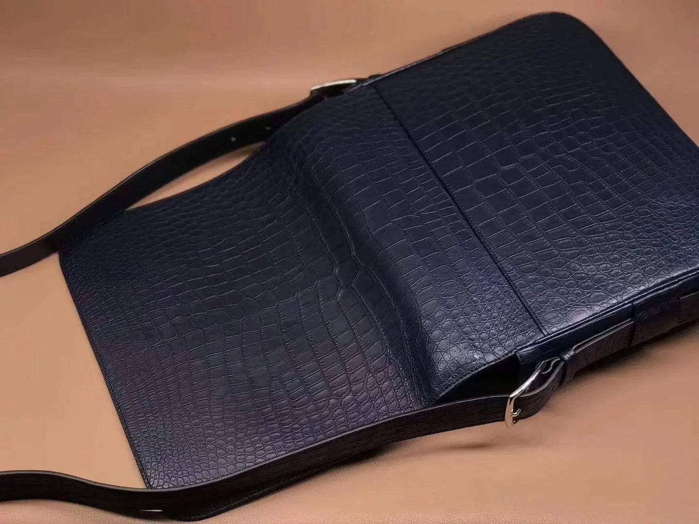 Rossie Viren crocodile garment leather medium messenger bag, soft handbag with a structured design and adjustable shoulder strap.