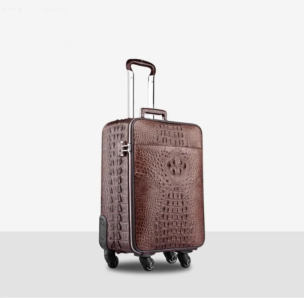 Crocodile leather 4-wheeled trolley suitcase by Rossie Viren, featuring a sleek, textured finish and sturdy travel luggage design.