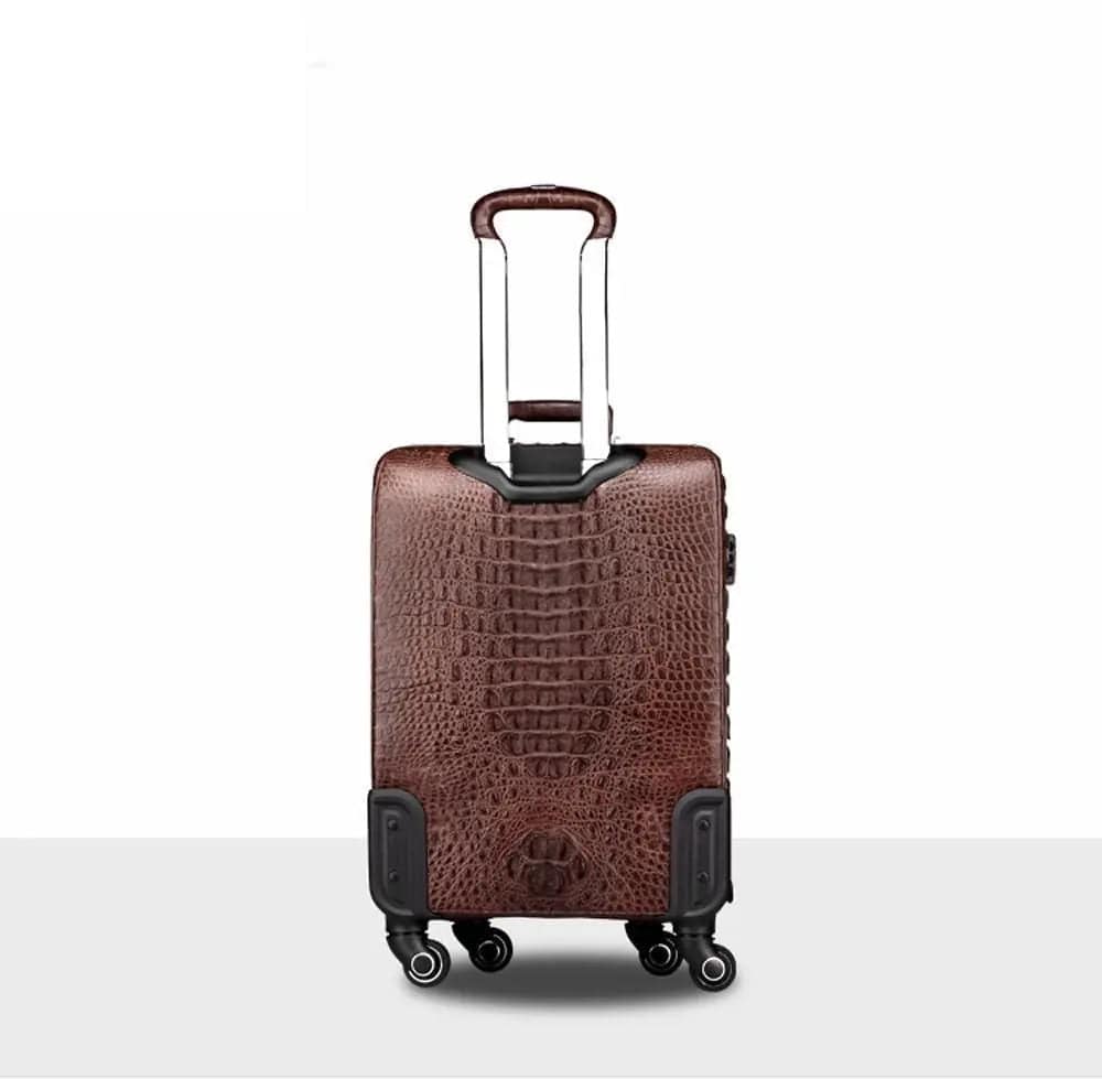 Rossie Viren crocodile leather 4-wheeled trolley suitcase with sturdy handle and sleek design for travel luggage.