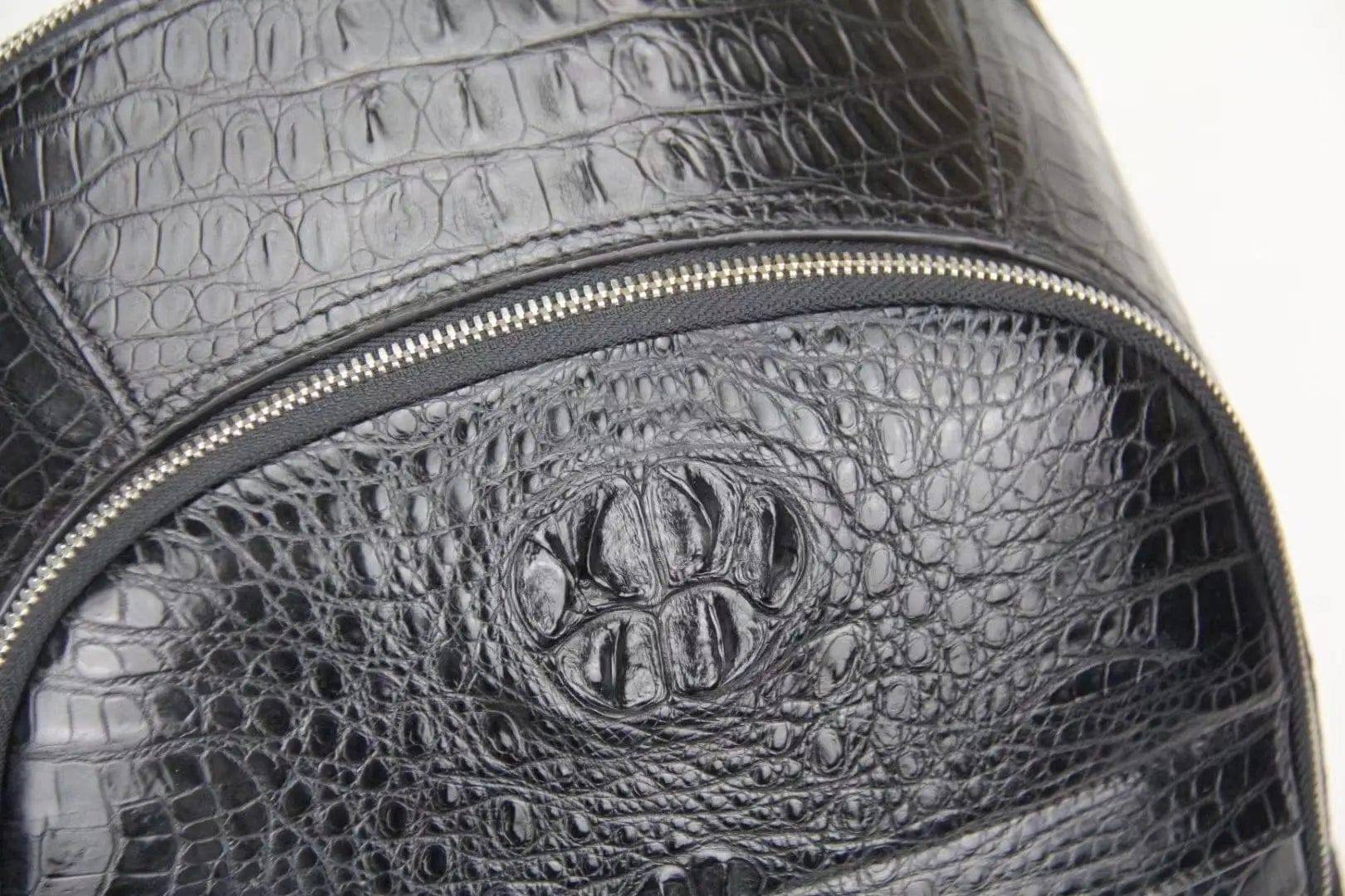 Rossie Viren crocodile leather backpack handbag with sturdy straps and textured crocodile pattern, stylish and functional.