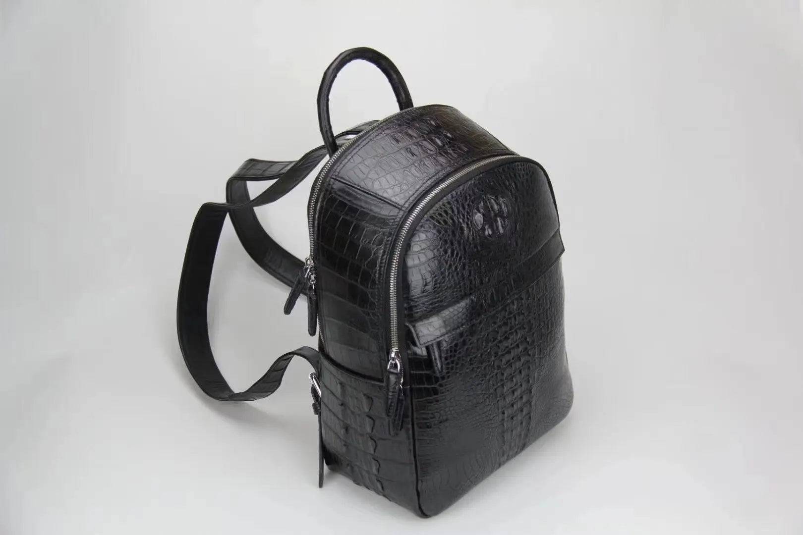 Rossie Viren crocodile leather backpack handbag with sleek design and textured crocodile pattern, featuring adjustable straps and top handle.