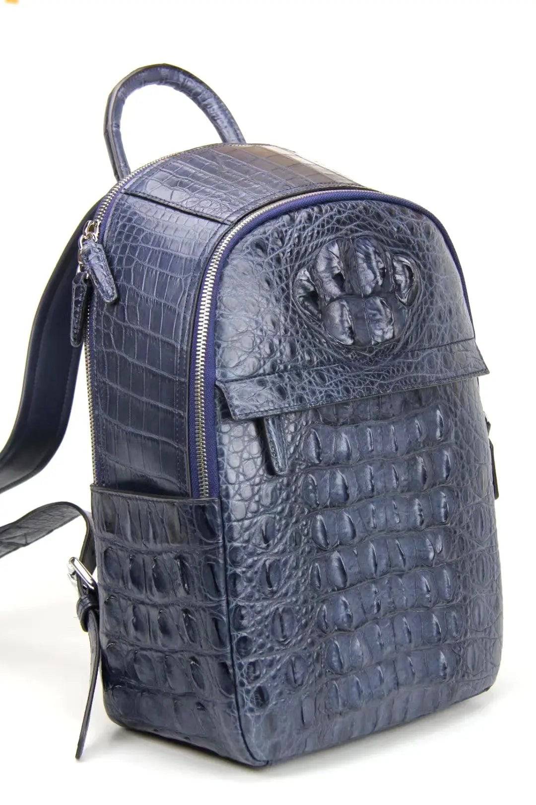 Rossie Viren crocodile leather backpack handbag with sleek design and textured crocodile skin exterior.