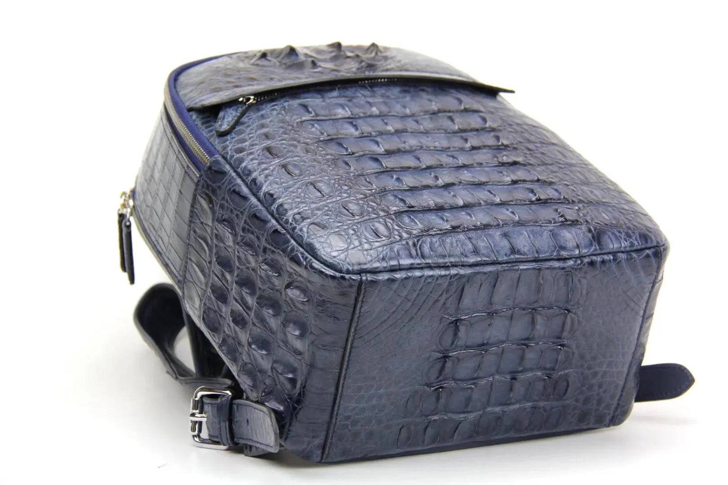 Rossie Viren crocodile leather backpack handbag with sleek design, featuring a textured crocodile pattern and adjustable straps.
