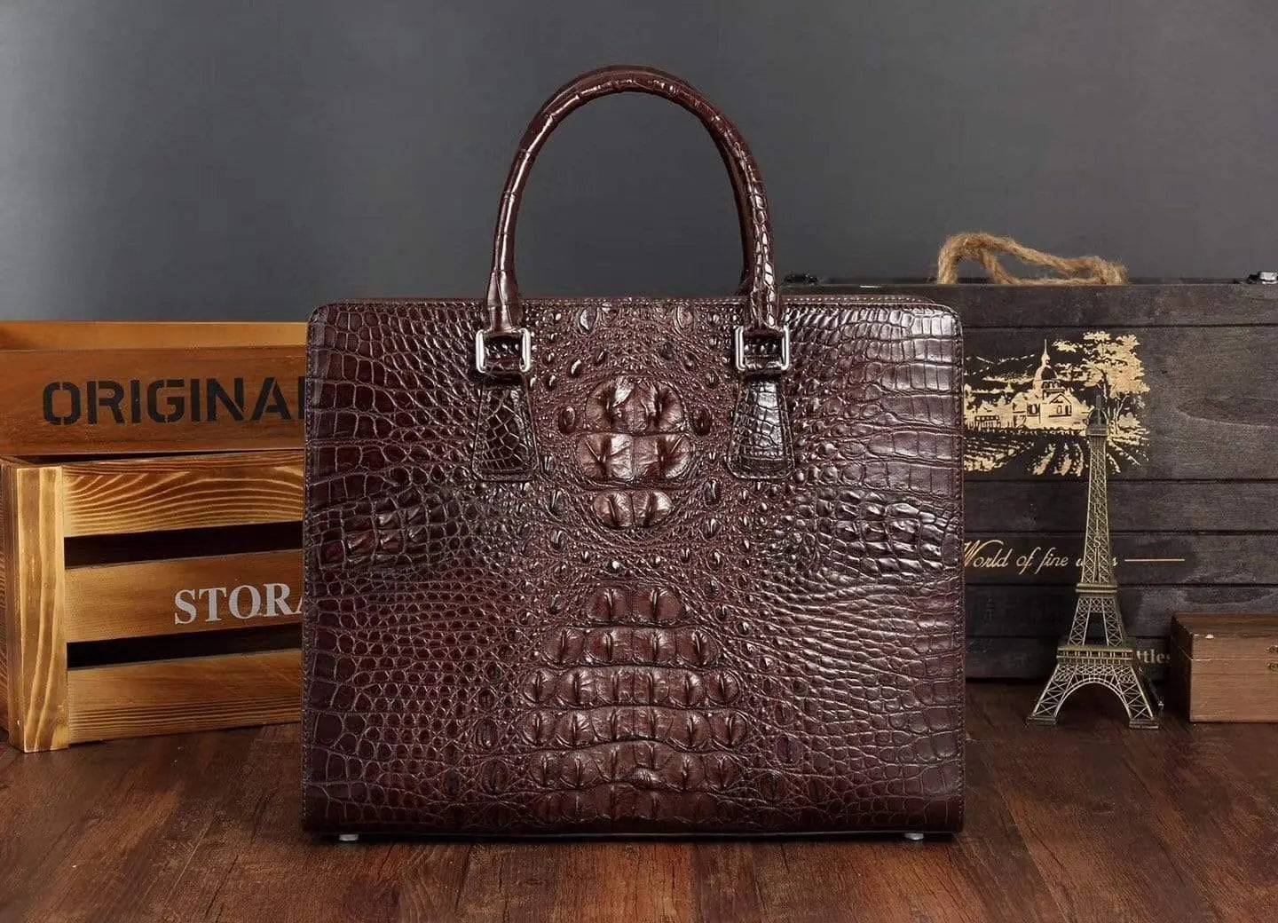 Rossie Viren crocodile leather briefcase handbag with sleek design, sturdy handle, and textured crocodile pattern.