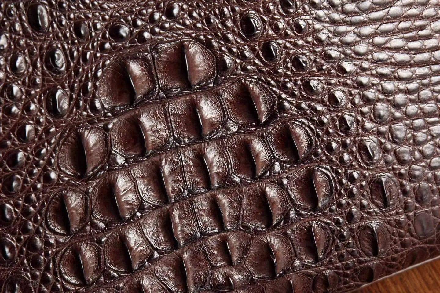Rossie Viren crocodile leather briefcase handbag with sturdy handle and textured crocodile pattern, stylish and professional.