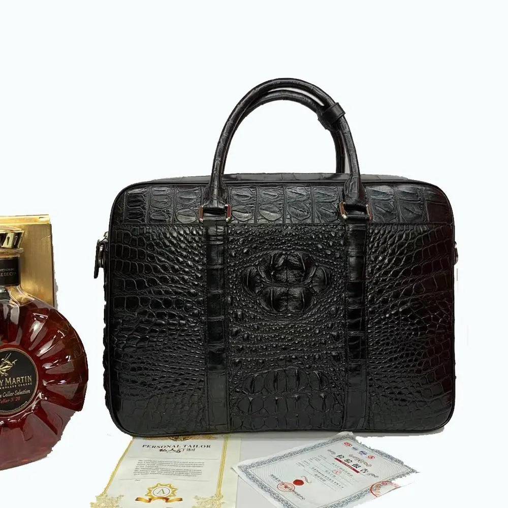 Large crocodile leather briefcase handbag by Rossie Viren showing textured crocodile pattern, sturdy handle, and spacious design.