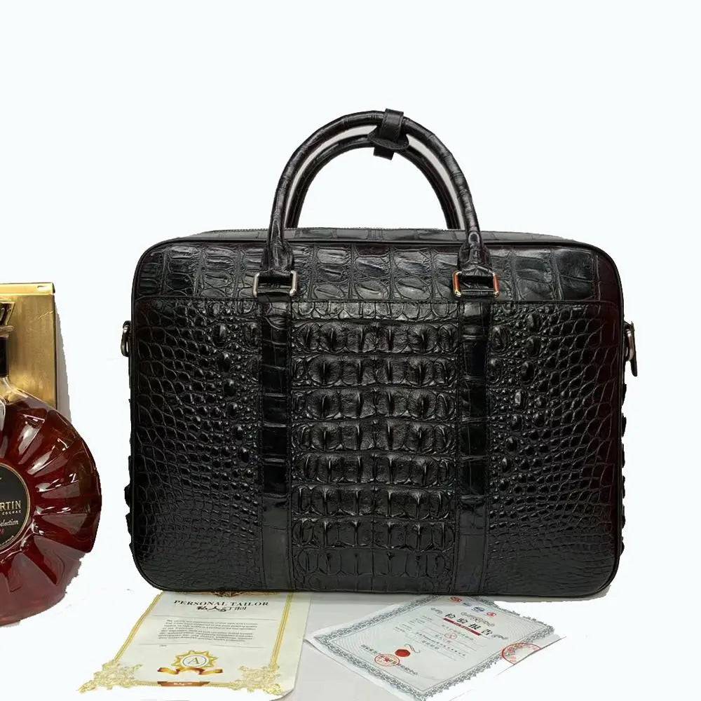 Large crocodile leather briefcase handbag by Rossie Viren with sturdy handles and sleek design.