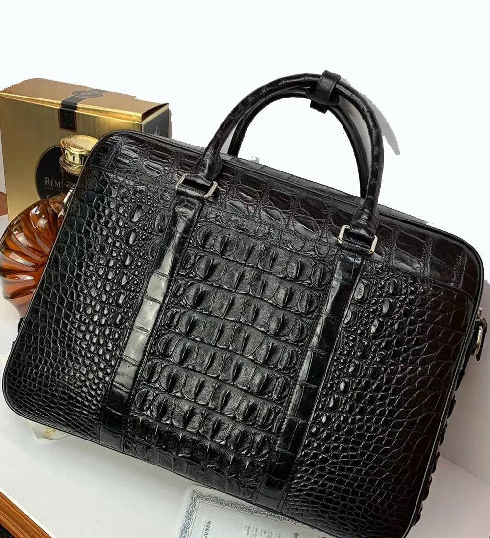 Large crocodile leather briefcase handbag by Rossie Viren, showcasing the textured crocodile pattern and sturdy handles.