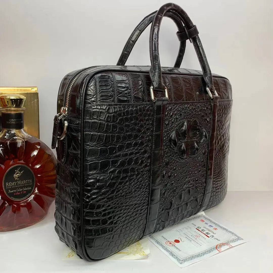 Large crocodile leather briefcase handbag by Rossie Viren, featuring a textured exterior and sturdy handle.