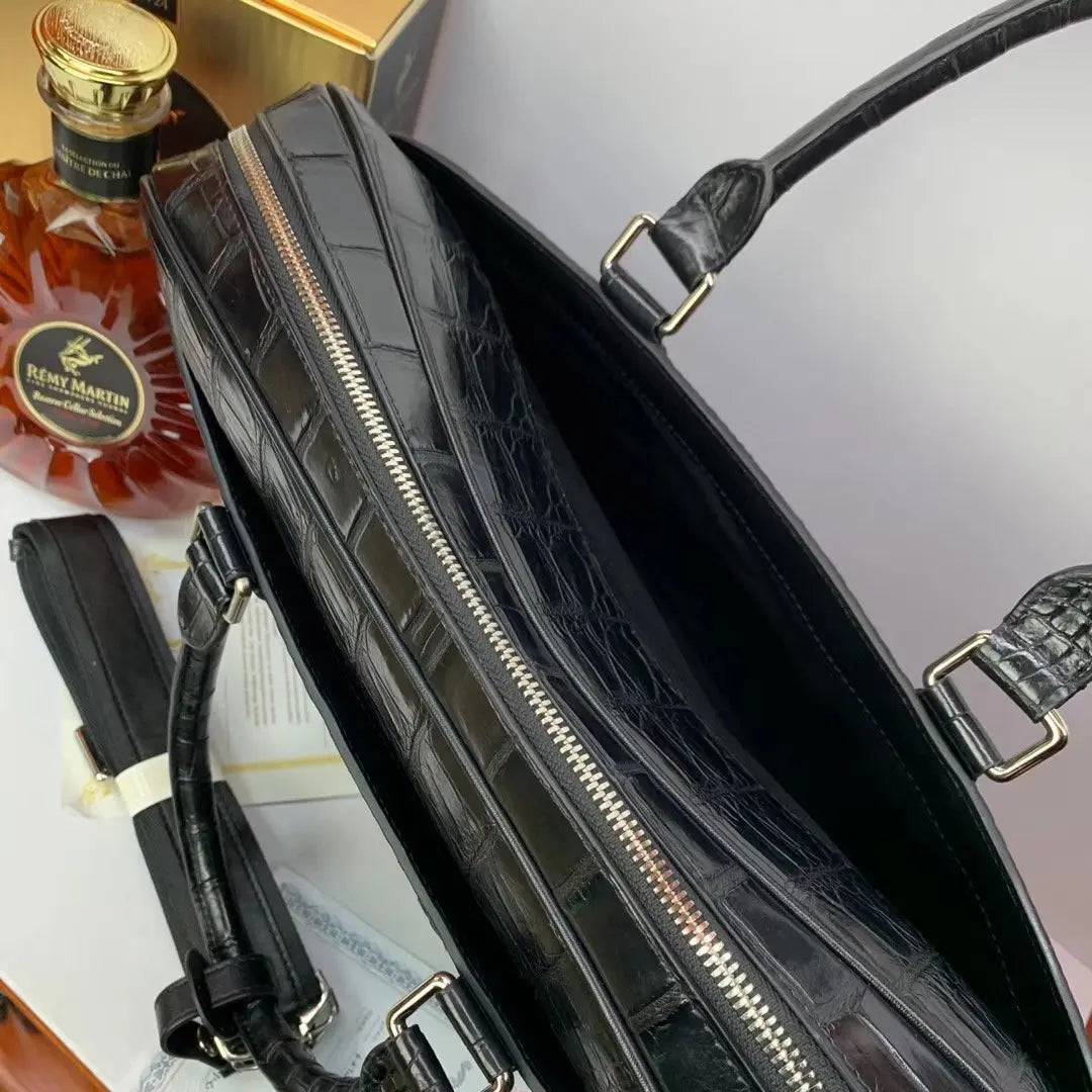 Large crocodile leather briefcase handbag by Rossie Viren, showcasing its textured crocodile skin and structured design.