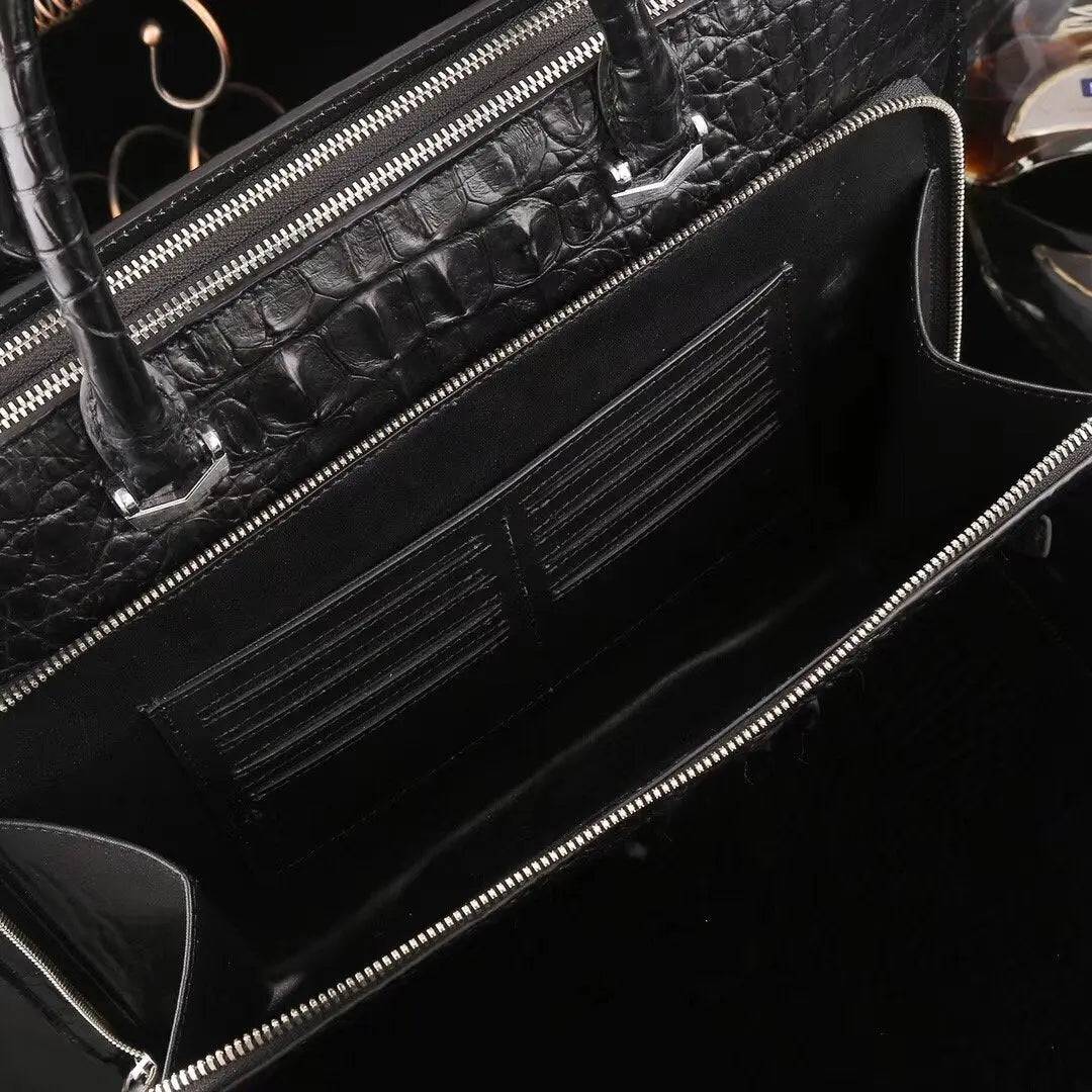 Rossie Viren crocodile leather briefcase handbag with a sleek design, suitable for carrying laptops and documents.