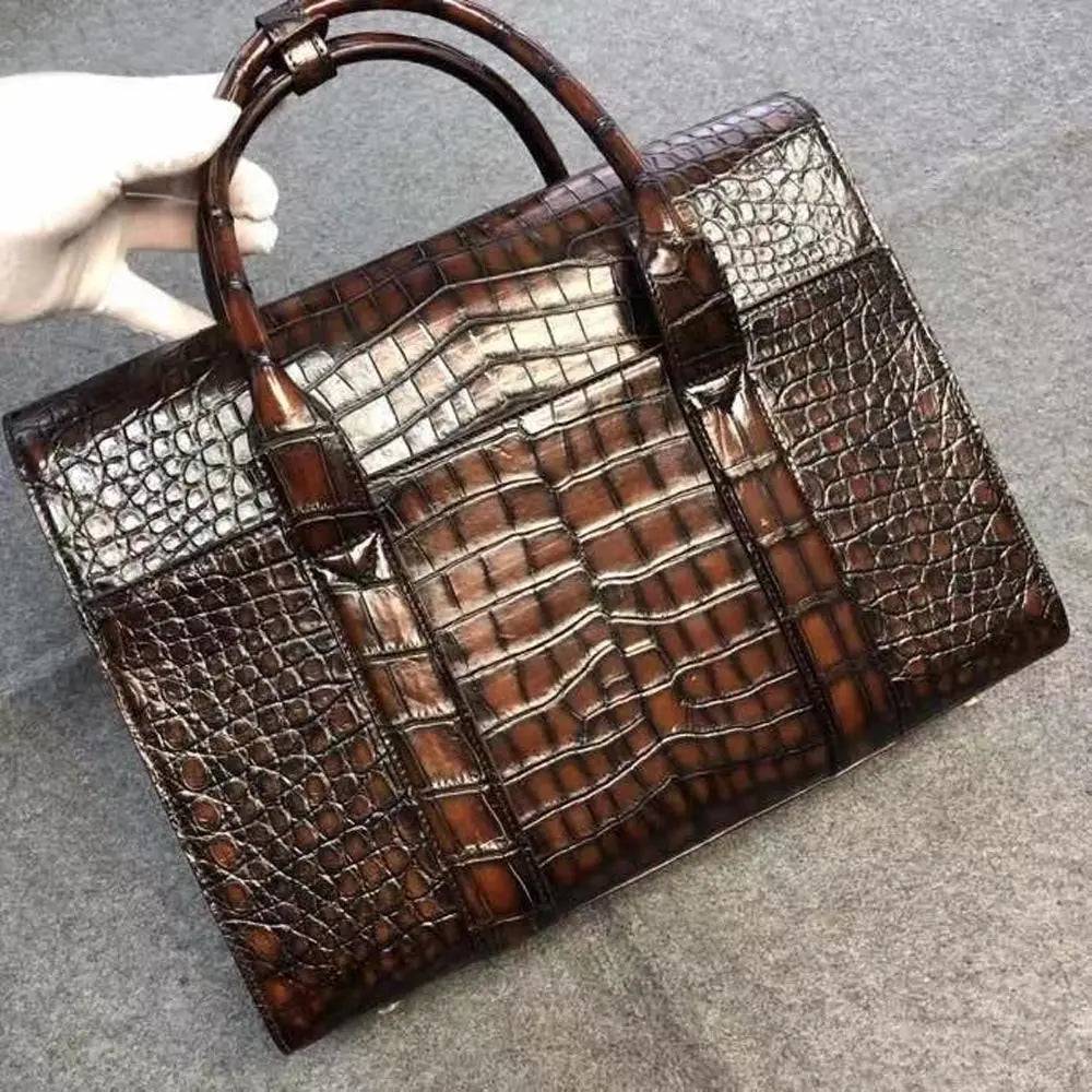 Vintage brown crocodile leather briefcase handbag by Rossie Viren, featuring a textured crocodile pattern and classic design.