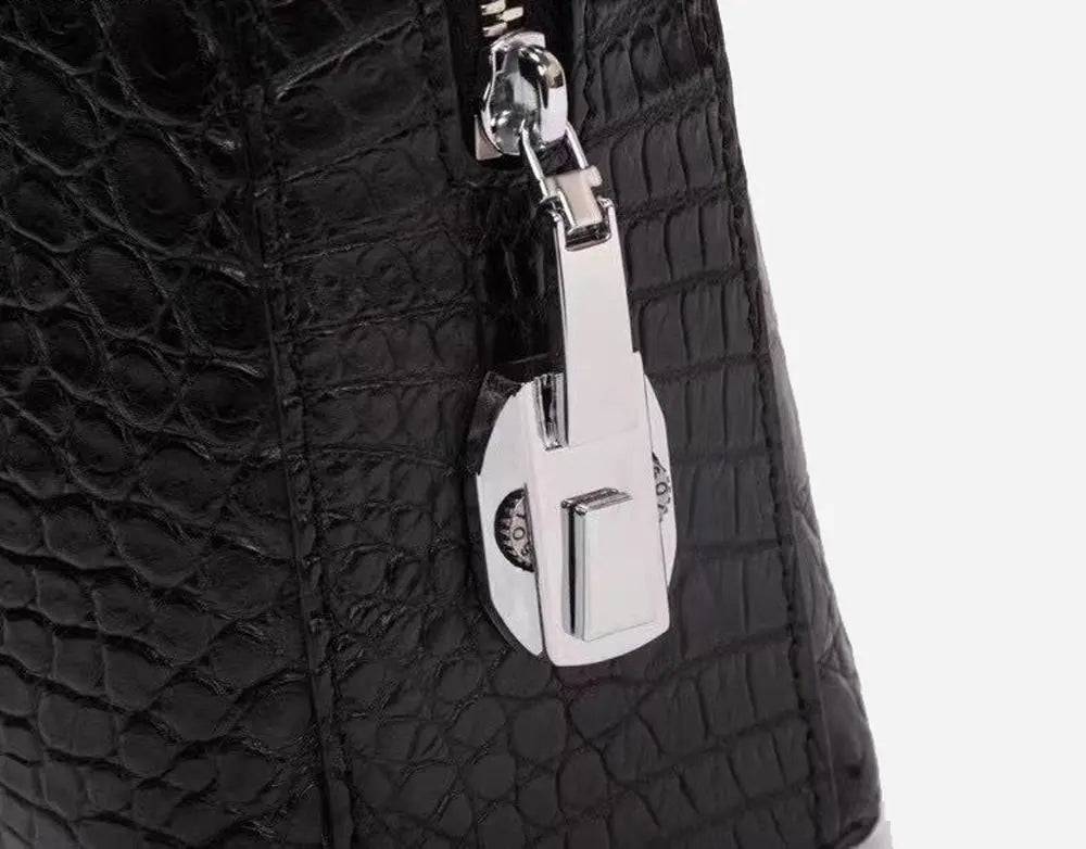 Crocodile leather briefcase with shoulder strap, password lock, and business design, by Crocodile Leather Bags and Shoes.