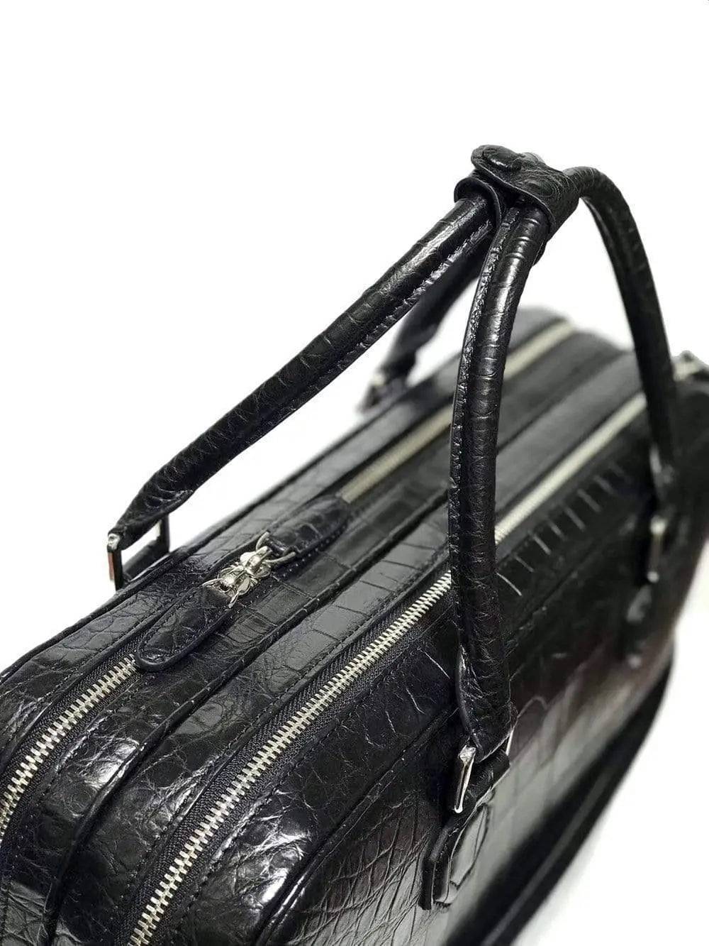 Large Rossie Viren crocodile leather briefcase with sturdy handles and sleek design, ideal for business and professional use.