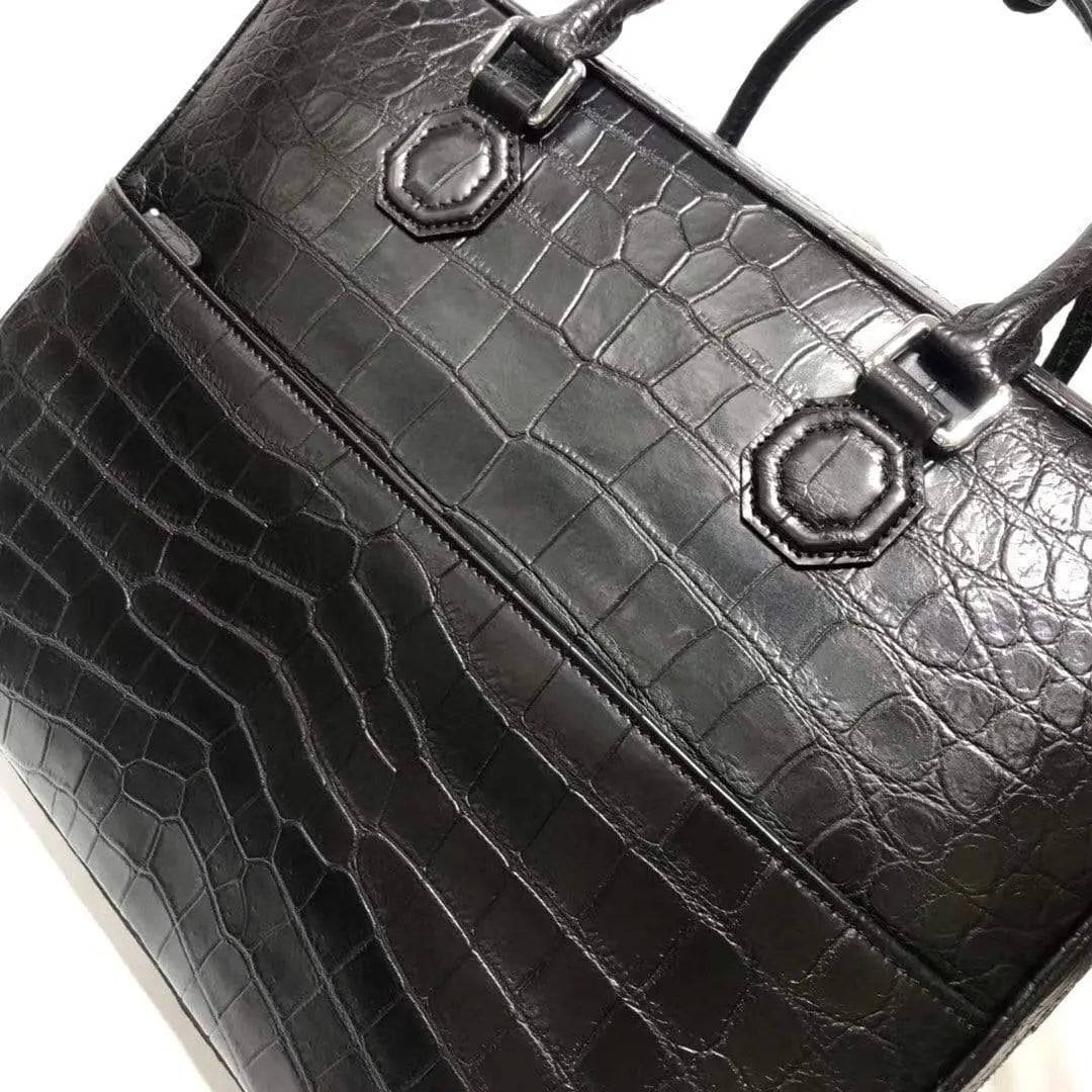 Large crocodile leather briefcase by Rossie Viren, stylish business bag with textured crocodile pattern and sturdy handles.