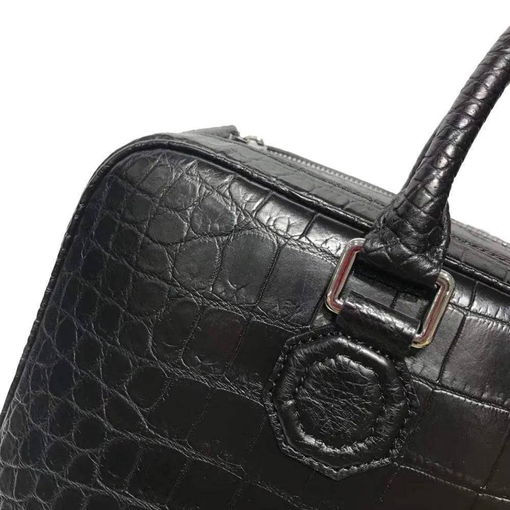 Large crocodile leather briefcase by Rossie Viren, stylish business bag with textured crocodile pattern and sturdy handles.