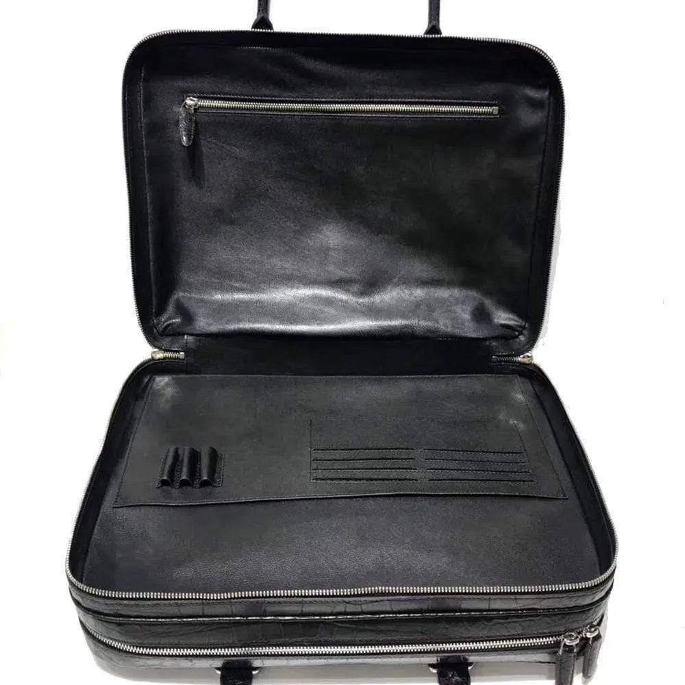 Large Rossie Viren crocodile leather briefcase with sturdy handles and sleek design, ideal for business professionals.