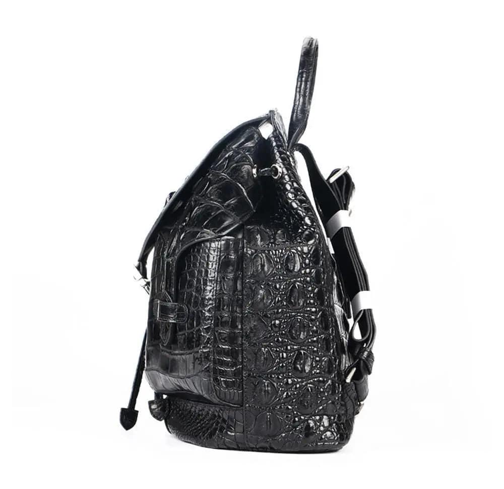 Rossie Viren crocodile leather city backpack handbag with sleek design and textured crocodile pattern, featuring adjustable straps and top handle.