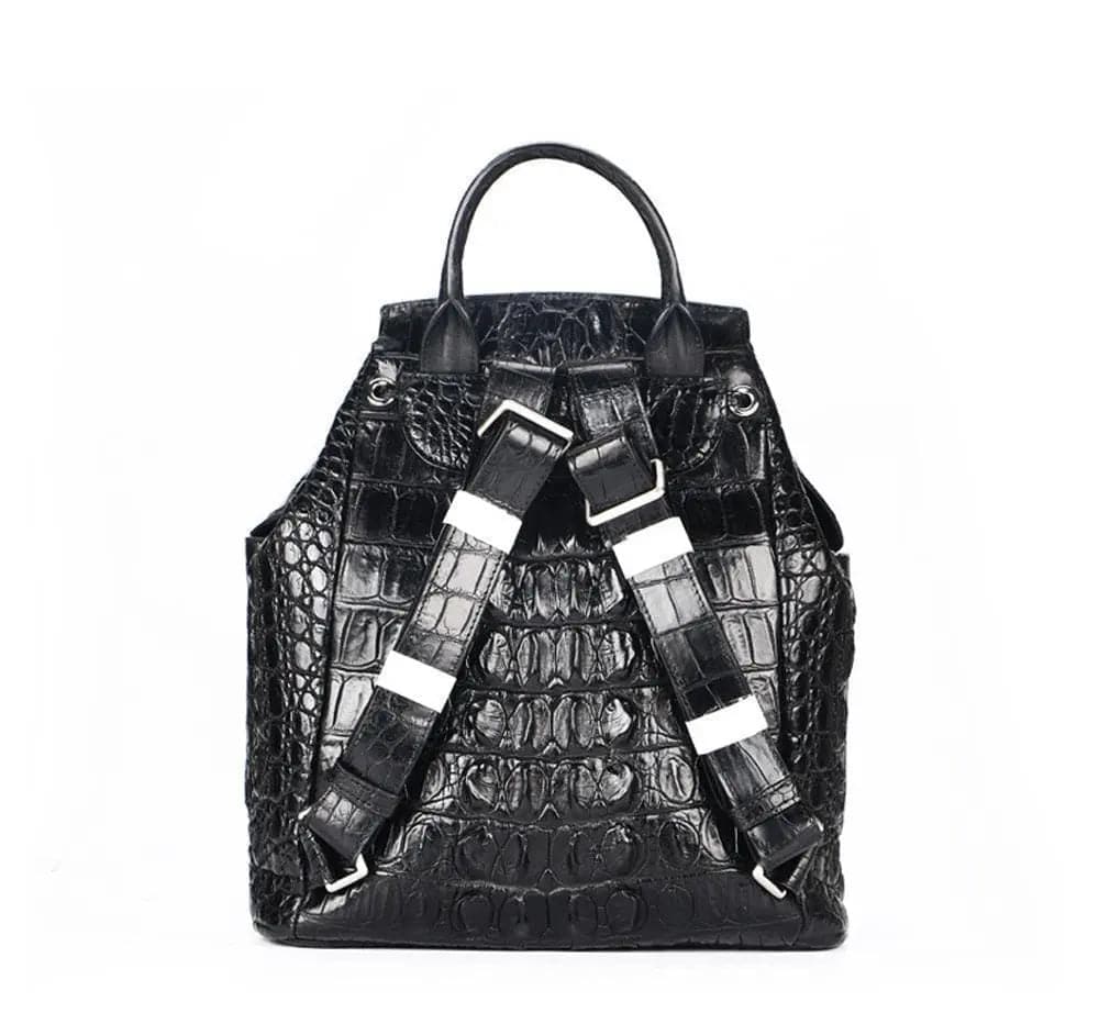Rossie Viren crocodile leather city backpack handbag with sleek design and sturdy straps on a neutral background.