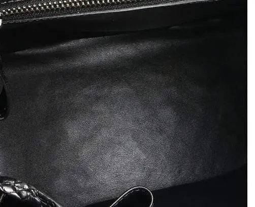 Rossie Viren crocodile leather city backpack handbag with sleek design and textured crocodile pattern, front pocket, and adjustable straps.