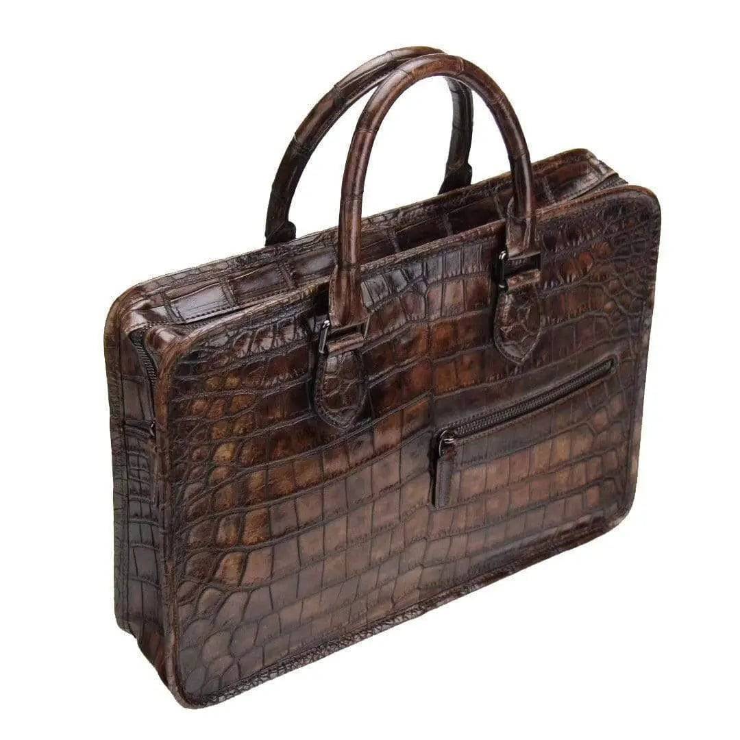 Rossie Viren crocodile leather crossbody handbag with a laptop compartment, designed for business and everyday use.