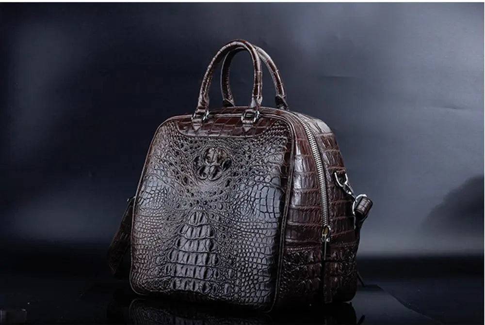 Brown crocodile leather duffel travel bag by Rossie Viren, showcasing sturdy handles and luxurious textured leather.