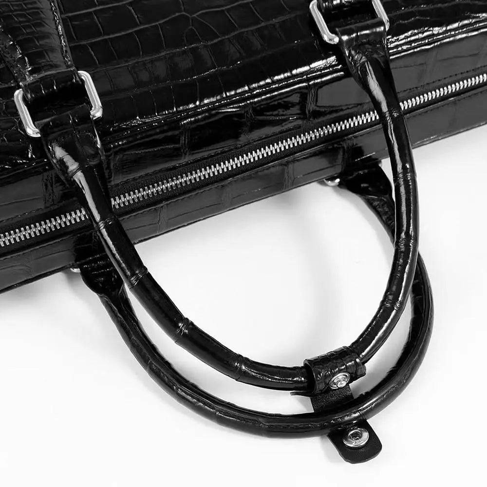 Rossie Viren crocodile leather laptop briefcase with combination lock, featuring a sleek, textured exterior and sturdy handles.